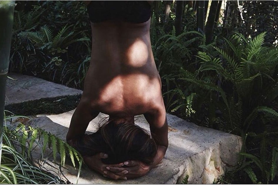 Halle Berry Amazes Us Once more — This Time With a Topless Headstand